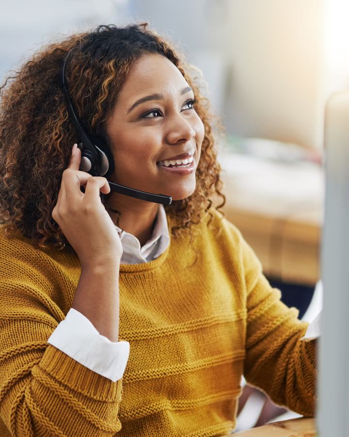 A livepro user taking a call in a contact centre